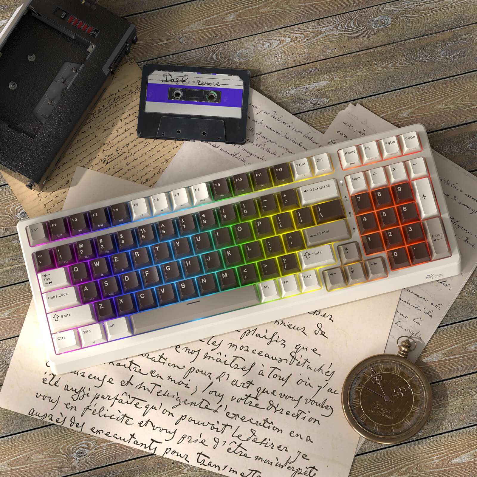 RK F99 96 keys Colorful keyboard on a wooden surface with a cassette tape, vintage camera, and pocket watch.