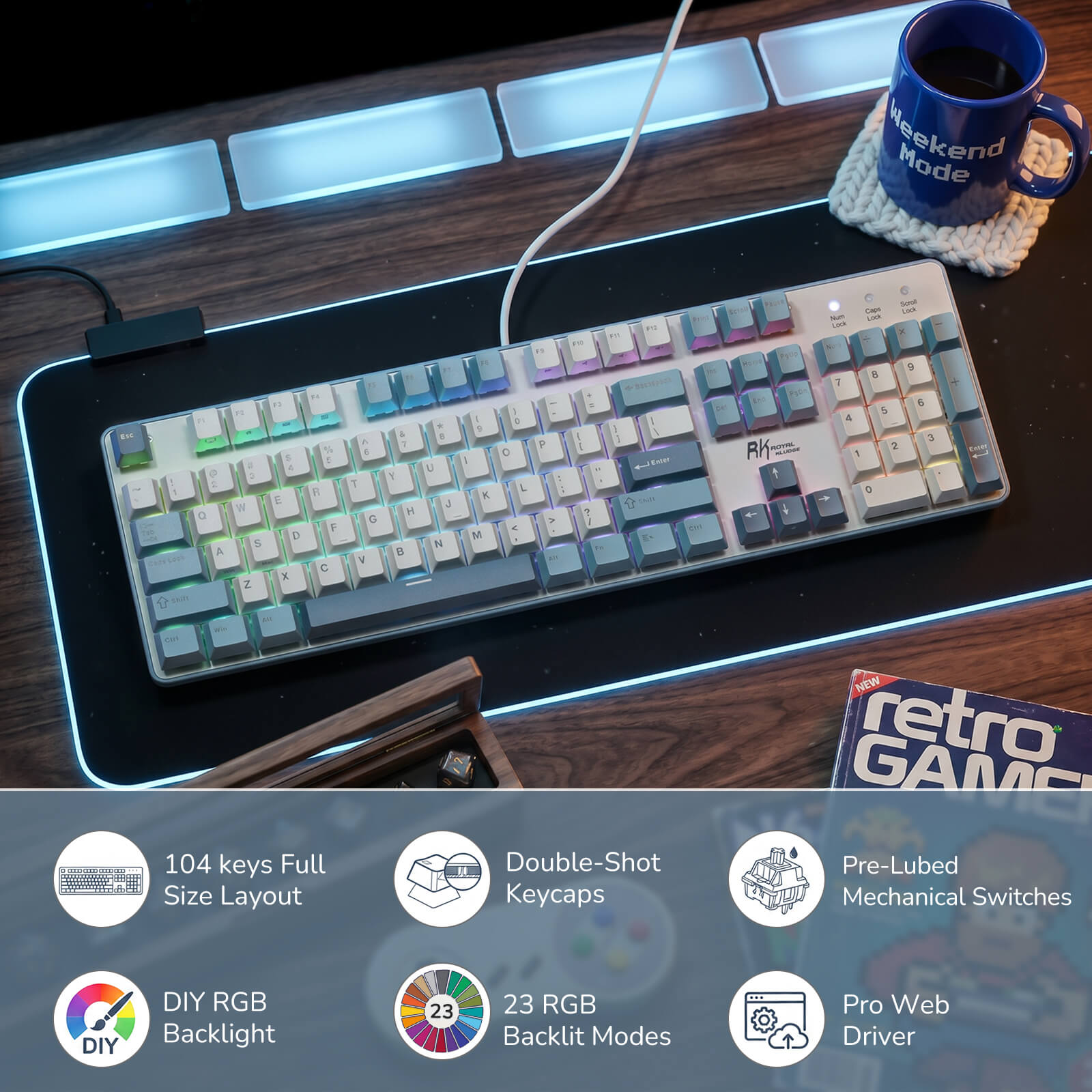 Mechanical keyboard on a desk with a mug and retro gaming magazine, featuring RGB lighting.